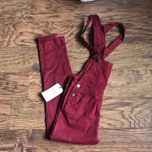 Burgundy skinny overall size medium